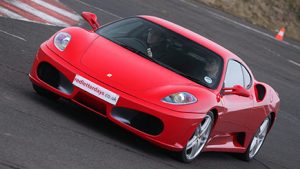 Junior Aston Martin versus Ferrari Driving